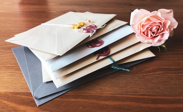 stack of colored greetings cards