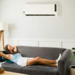 person relaxing under ac